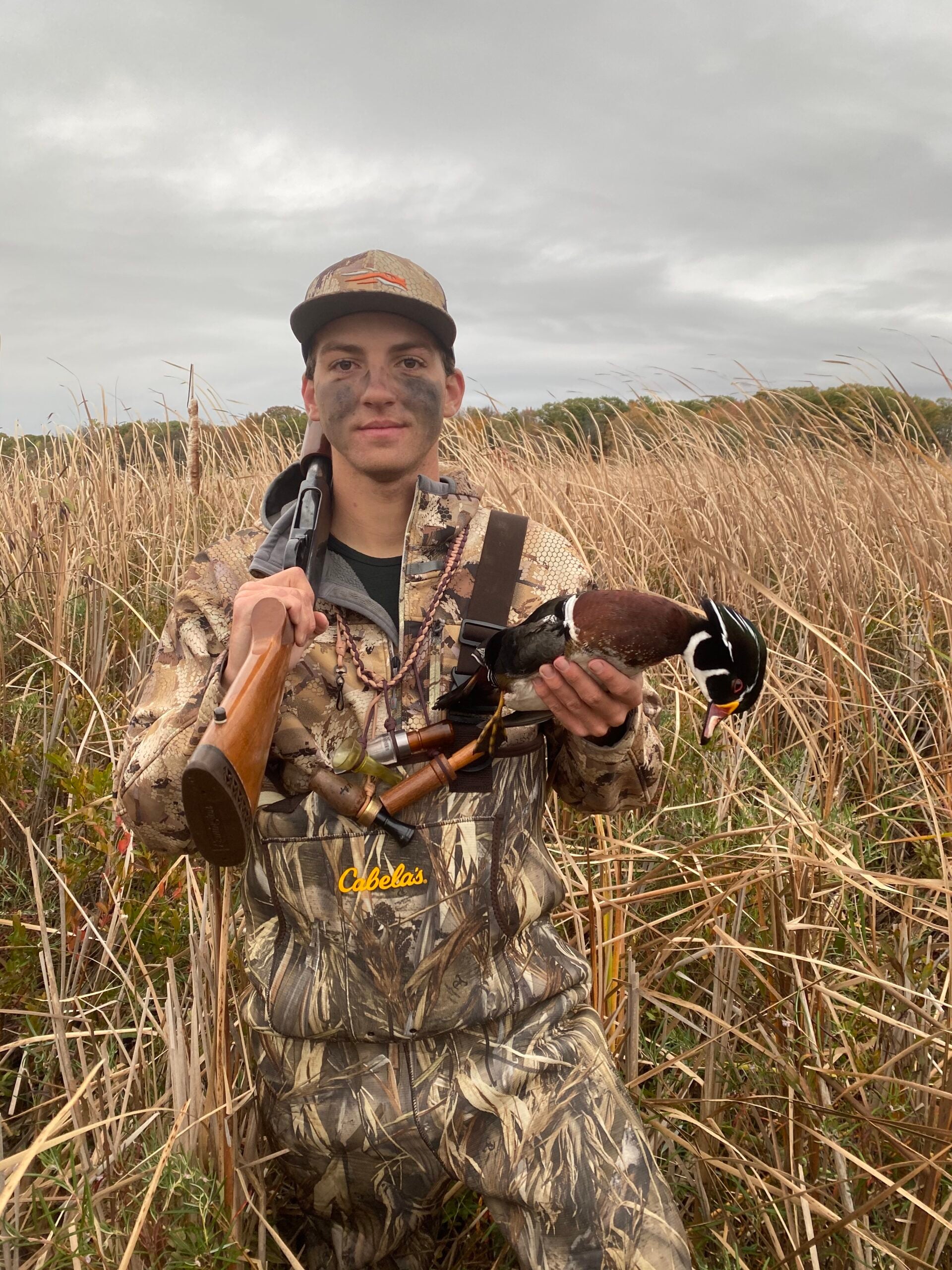 hunter holding drake woodie